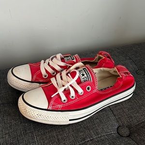 Red slip on converse shoes